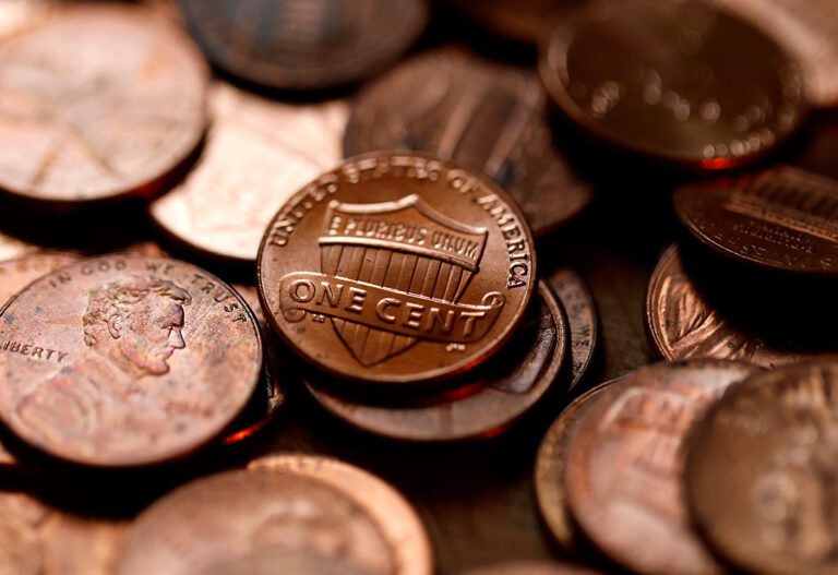 Without pennies, should retailers round up or down? States offer their 2 cents.